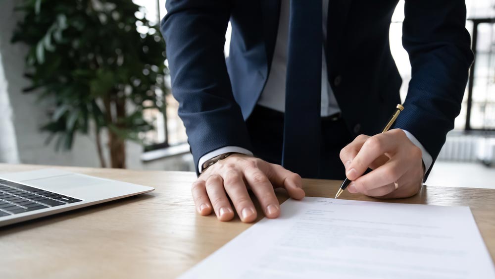 Solicitor Reviewing Documents