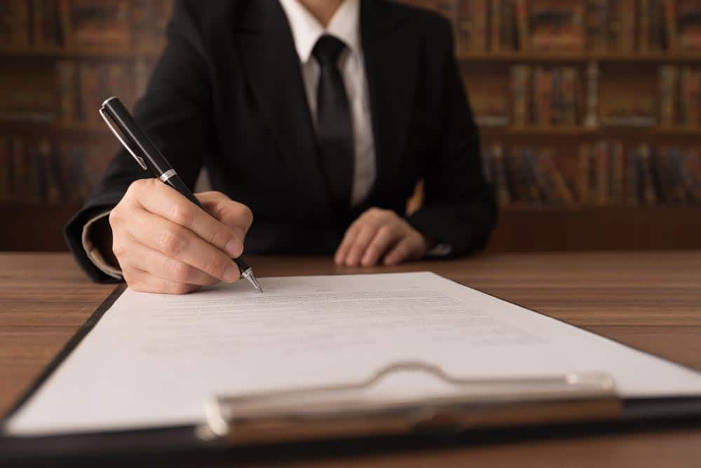 Lawyer Signing A Document