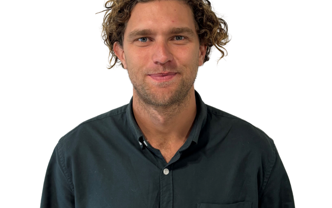 Smiling curly haired male solicitor