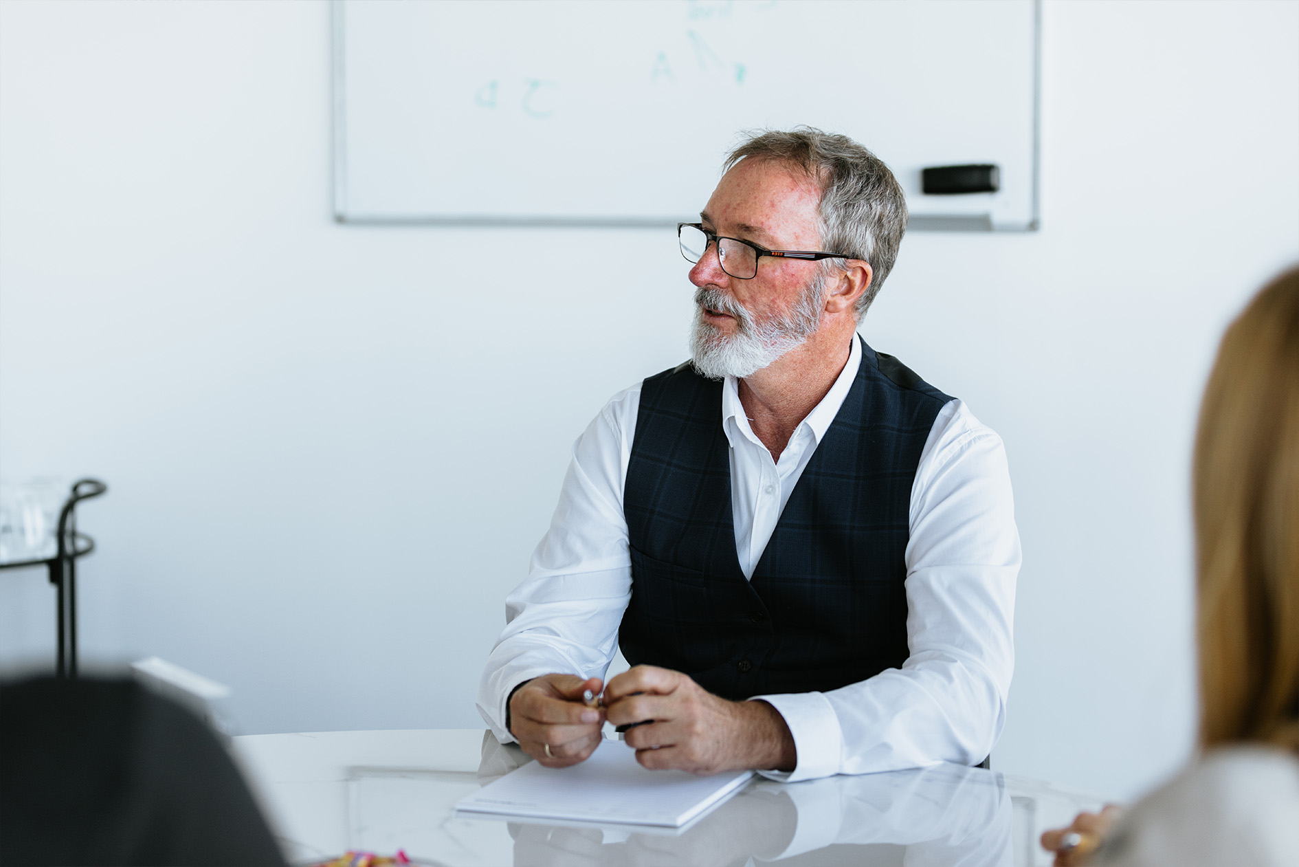 builder-dispute Senior male solicitor with beard