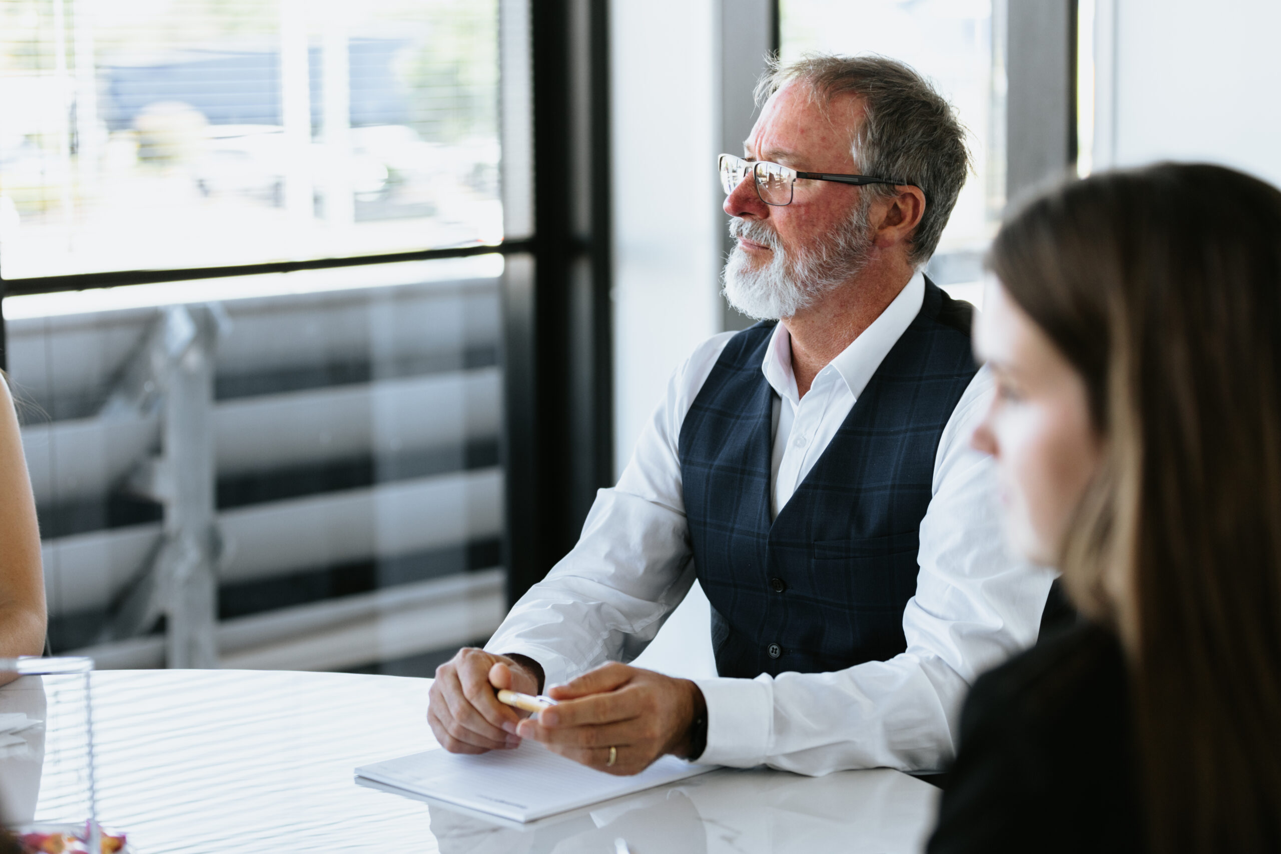 male lawyer with beard explaining legal information